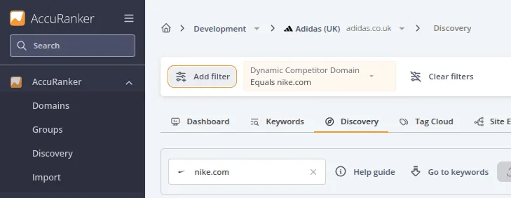 Discovery page with a Dynamic Competitor Domain filter applied to show keyword opportunities related to nike.com, and the Add filter button highlighted.