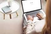 woman using google on laptop