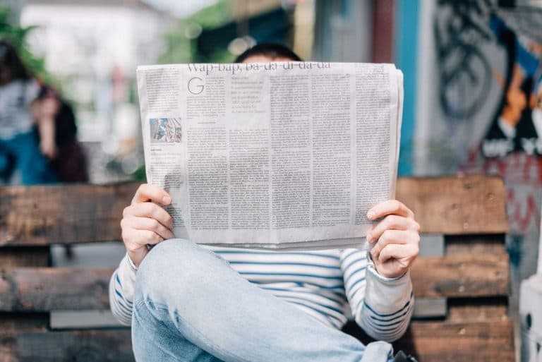 https://wp.preproduction.servers.ac/wp-content/uploads/2018/11/man-sitting-on-bench-reading-newspaper-768x513.jpg